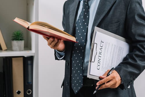 businessman-holding-book-clipboard-with-contract